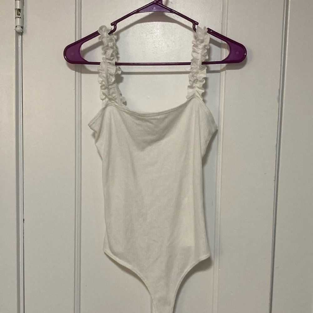 White ribbed ruffle body suit